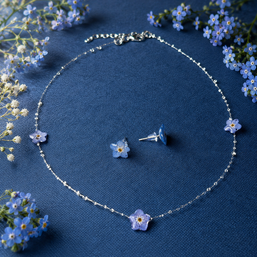 Forglemmegei smykkesett med ekte blomster – choker og øredobber i resin